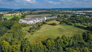 © Rediscovering the Antonine Wall Project
Cadder Fort site from above, fields and woodland with an area of industrial buildings next to it. Hills and blue sky beyond. © Rediscovering the Antonine Wall Project
Cadder Fort site from above, fields and woodland with an area of industrial buildings next to it. Hills and blue sky beyond.