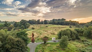 © Rediscovering the Antonine Wall Project
Croy hill from above, with the Silvanus sculpture at Nethercroy in front. A wooded hill and grassland with the sky beyond. © Rediscovering the Antonine Wall Project
Croy hill from above, with the Silvanus sculpture at Nethercroy in front. A wooded hill and grassland with the sky beyond.