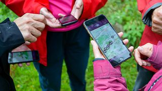 © Historic Environment Scotland
Three sets of hands seen from above. They hold mobile phones showing the Antonine Wall interactive map. © Historic Environment Scotland
Three sets of hands seen from above. They hold mobile phones showing the Antonine Wall interactive map.