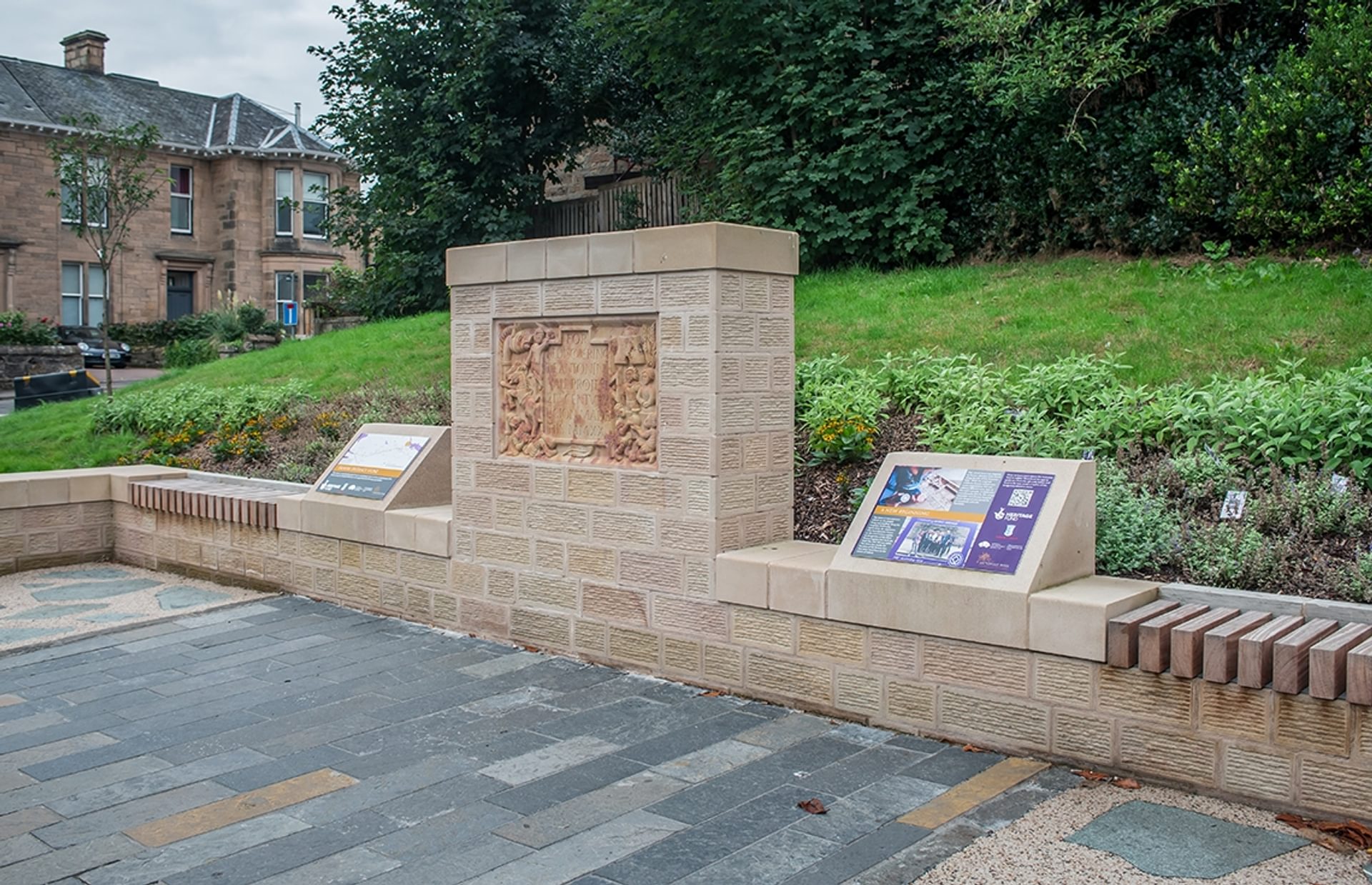 © Rediscovering the Antonine Wall Project
The replica Distance Stone, Falkirk, of sandstone, set in a wall of the same with an interpretation board set in a low wall. © Rediscovering the Antonine Wall Project
The replica Distance Stone, Falkirk, of sandstone, set in a wall of the same with an interpretation board set in a low wall.